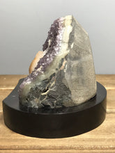 Amethyst geode with calcite on a wood base - RocciaRoba
